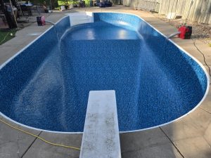 Madison, WI. Merlin Aqua-intense Blue Lapis, All Over bottom, with Luster, in the .27 mil