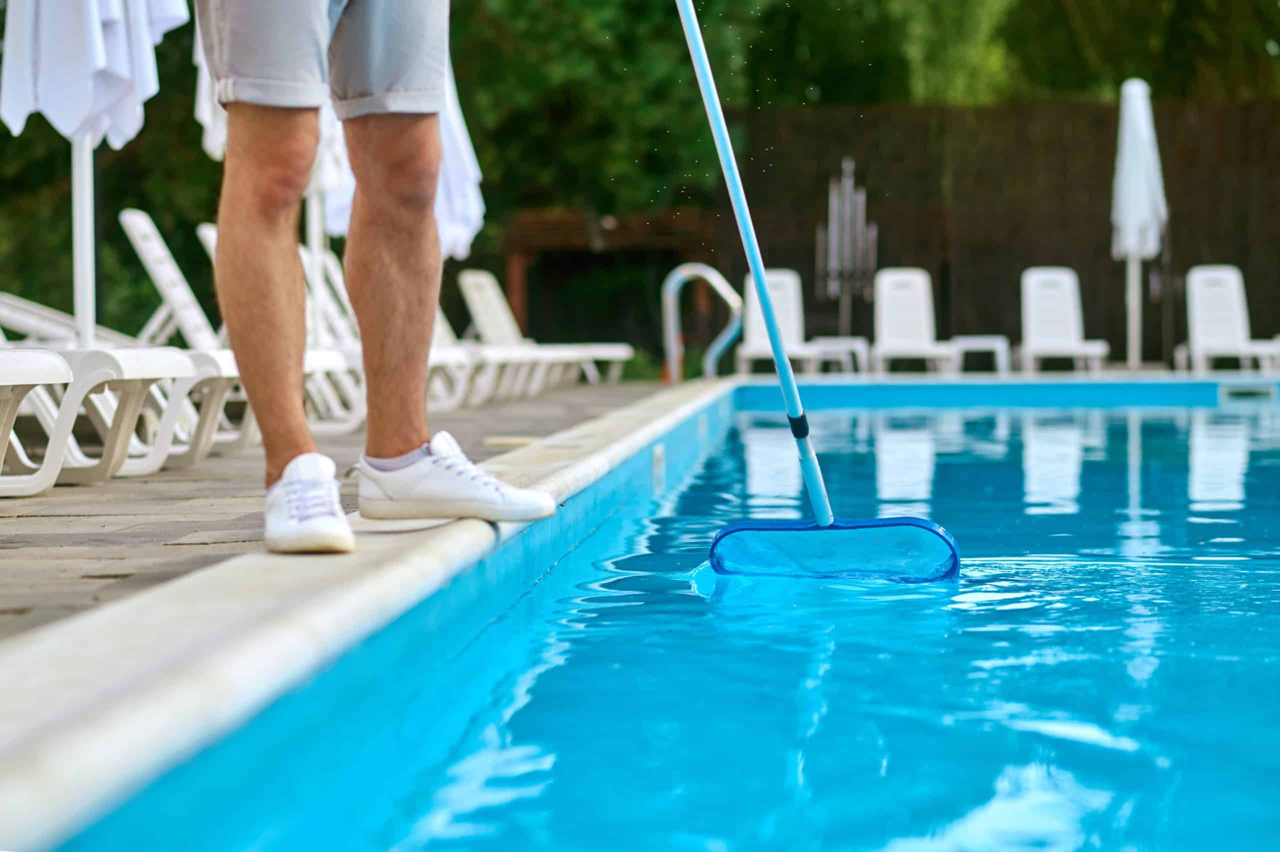 Man servicing a pool